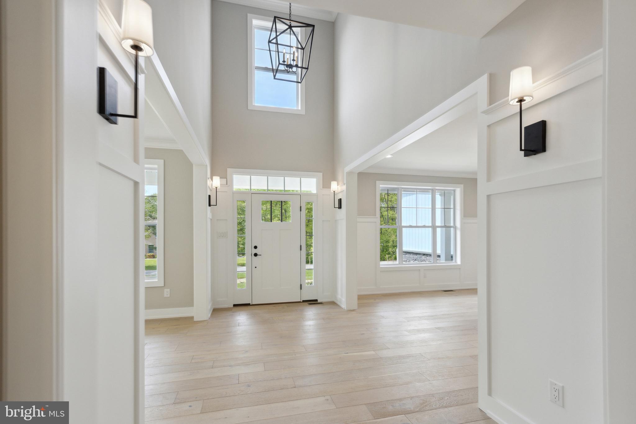 1 Beech Hollow Road Lower Gwynedd, PA 19002 - Photo 5 of 17 a view of an empty room with a window and wooden floor