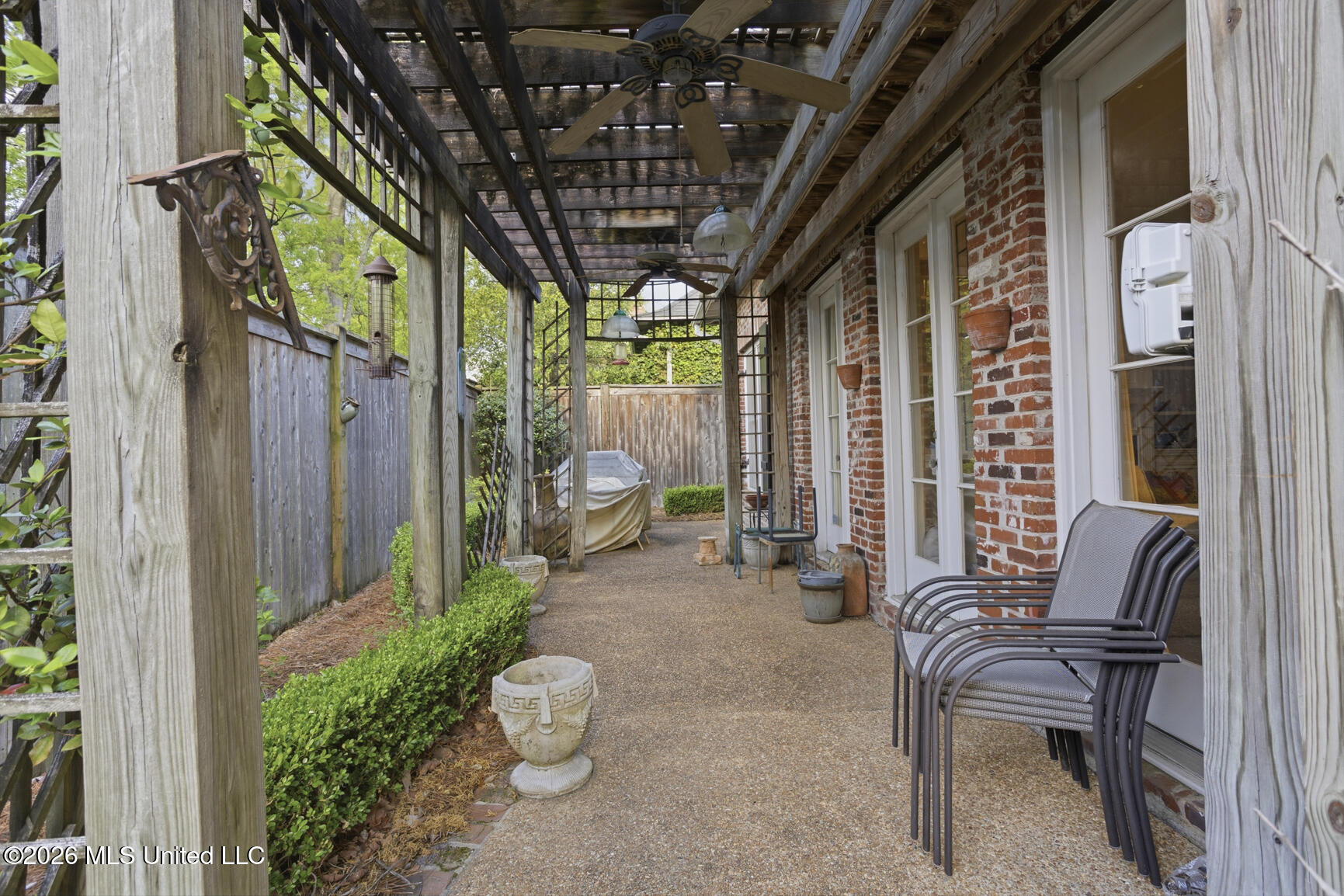 1641 Acadia Court Jackson, MS 39211 - Photo 27 of 28 Back Porch with Privacy Fence