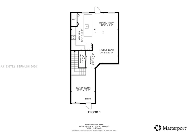 a picture of a bench in front of a white house