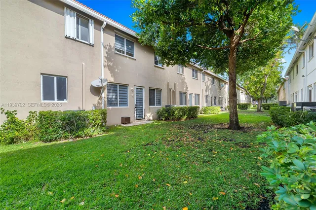 a house view with a garden space