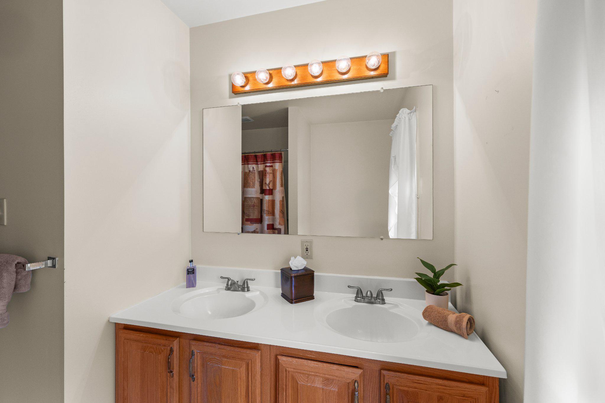 443 Crosswinds Drive Lititz, PA 17543 - Photo 18 of 26 a bathroom with a sink and a mirror
