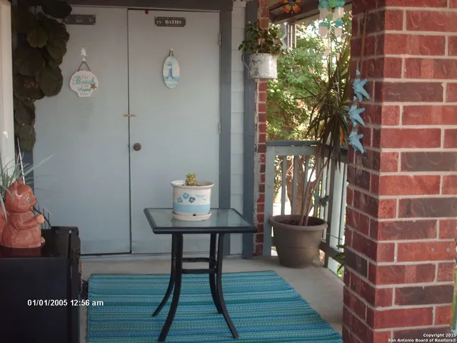 a view of a room with a table and chair