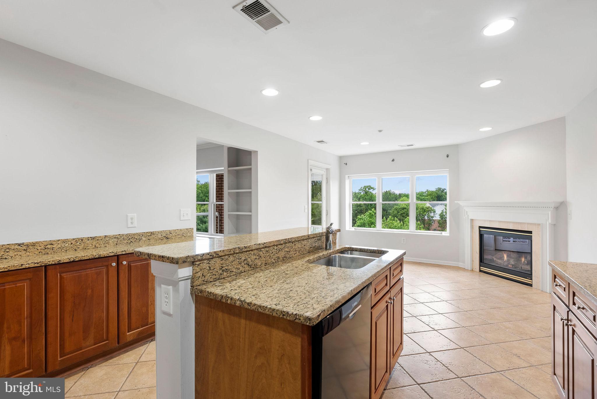 12246 Roundwood Road, Unit 506 Lutherville-Timonium, MD 21093 - Photo 11 of 32 Sunfilled Kitchen