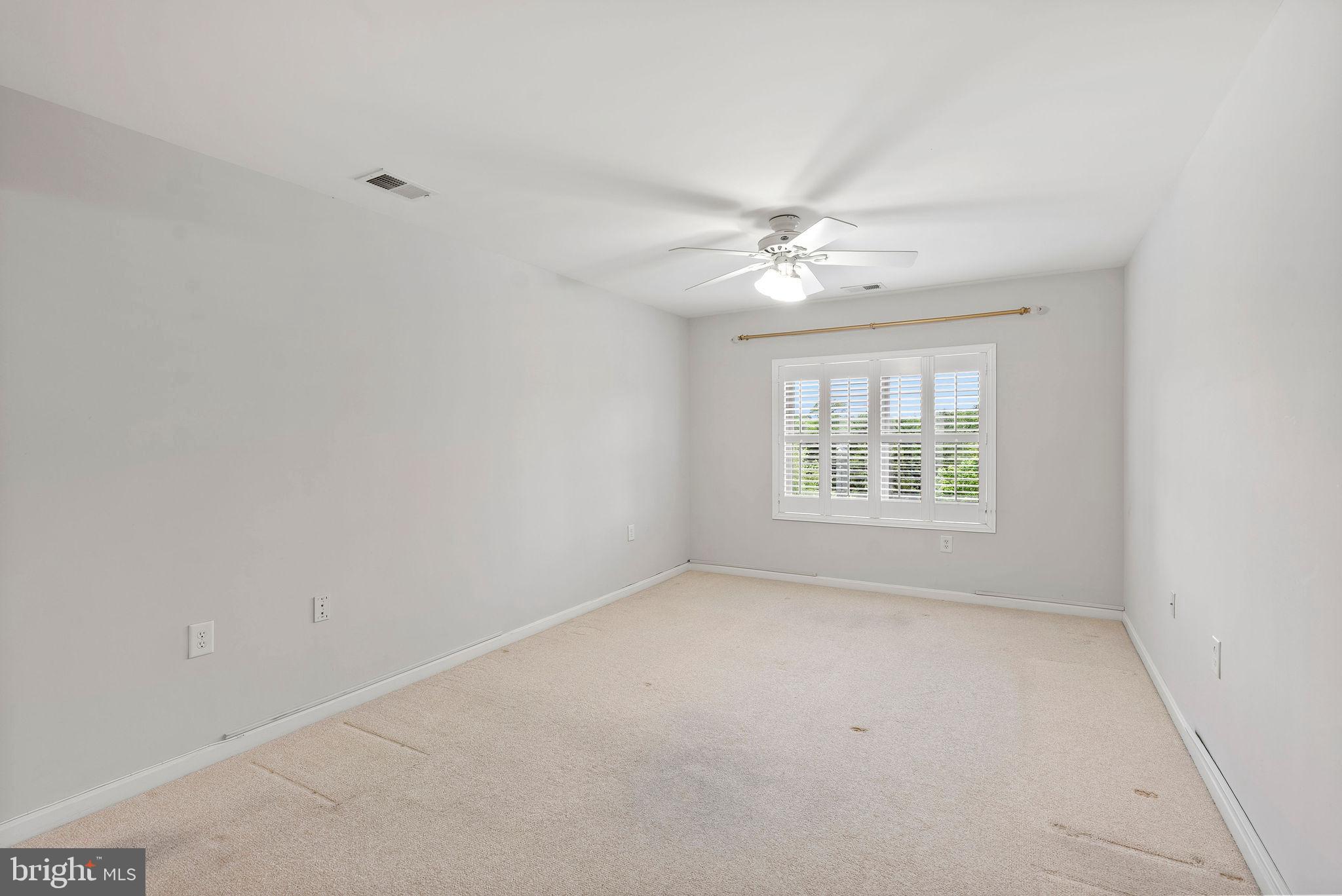 12246 Roundwood Road, Unit 506 Lutherville-Timonium, MD 21093 - Photo 21 of 32 Primary Bedroom