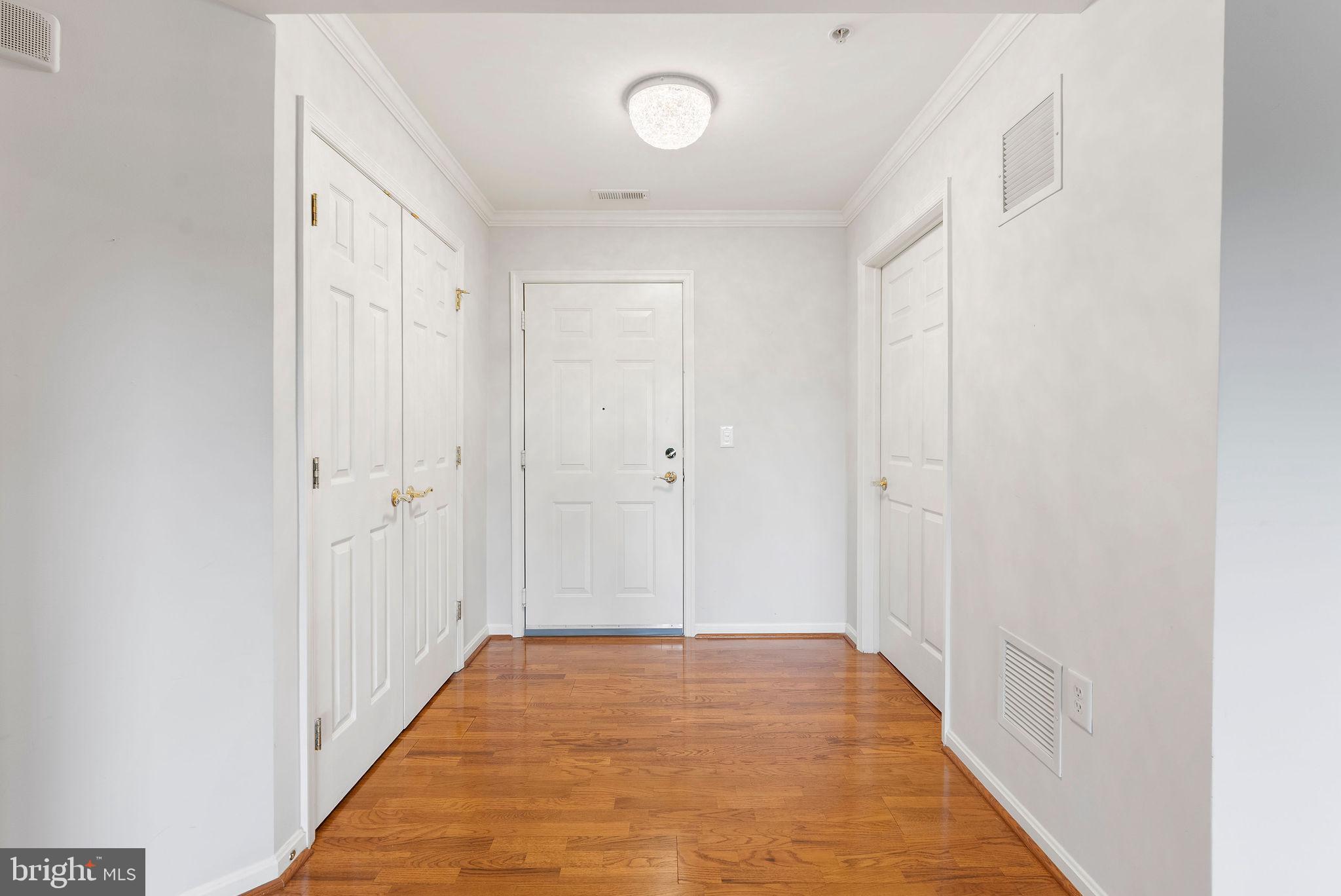 12246 Roundwood Road, Unit 506 Lutherville-Timonium, MD 21093 - Photo 8 of 32 Foyer w/ Coat Closet