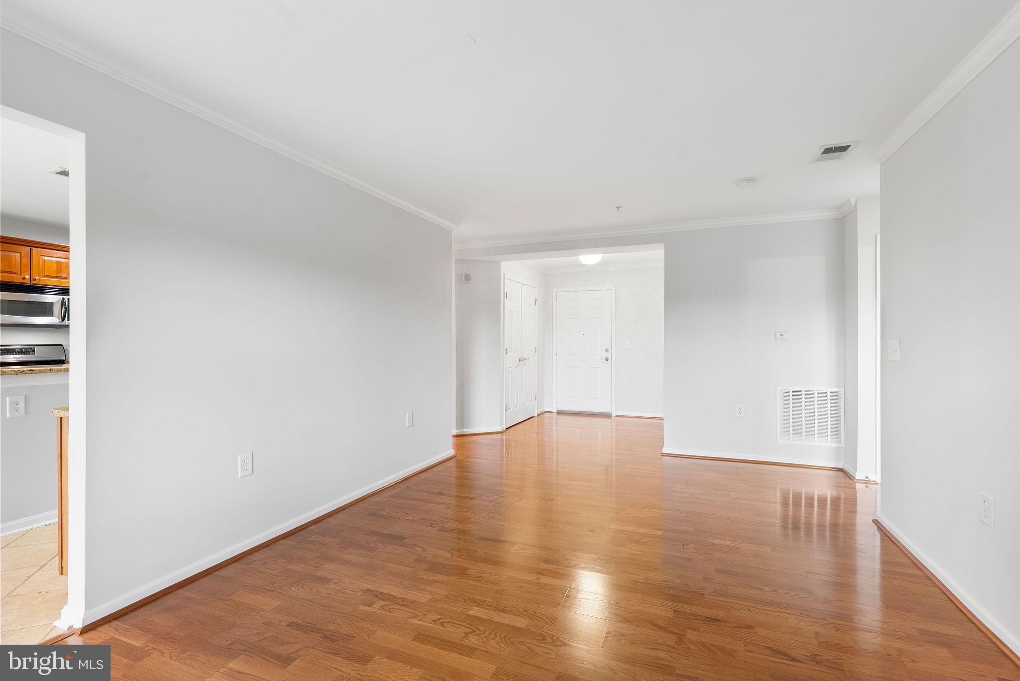 12246 Roundwood Road, Unit 506 Lutherville-Timonium, MD 21093 - Photo 10 of 32 Living Room w/ Hardwoods