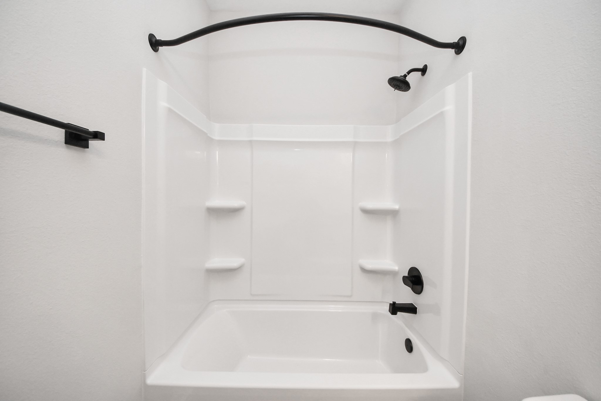 7711 Longmire Road, Unit 5 Conroe, TX 77304 - Photo 16 of 48 Primary Suite offers walk-closet,bath w/dual vanities&lux tub/shower.