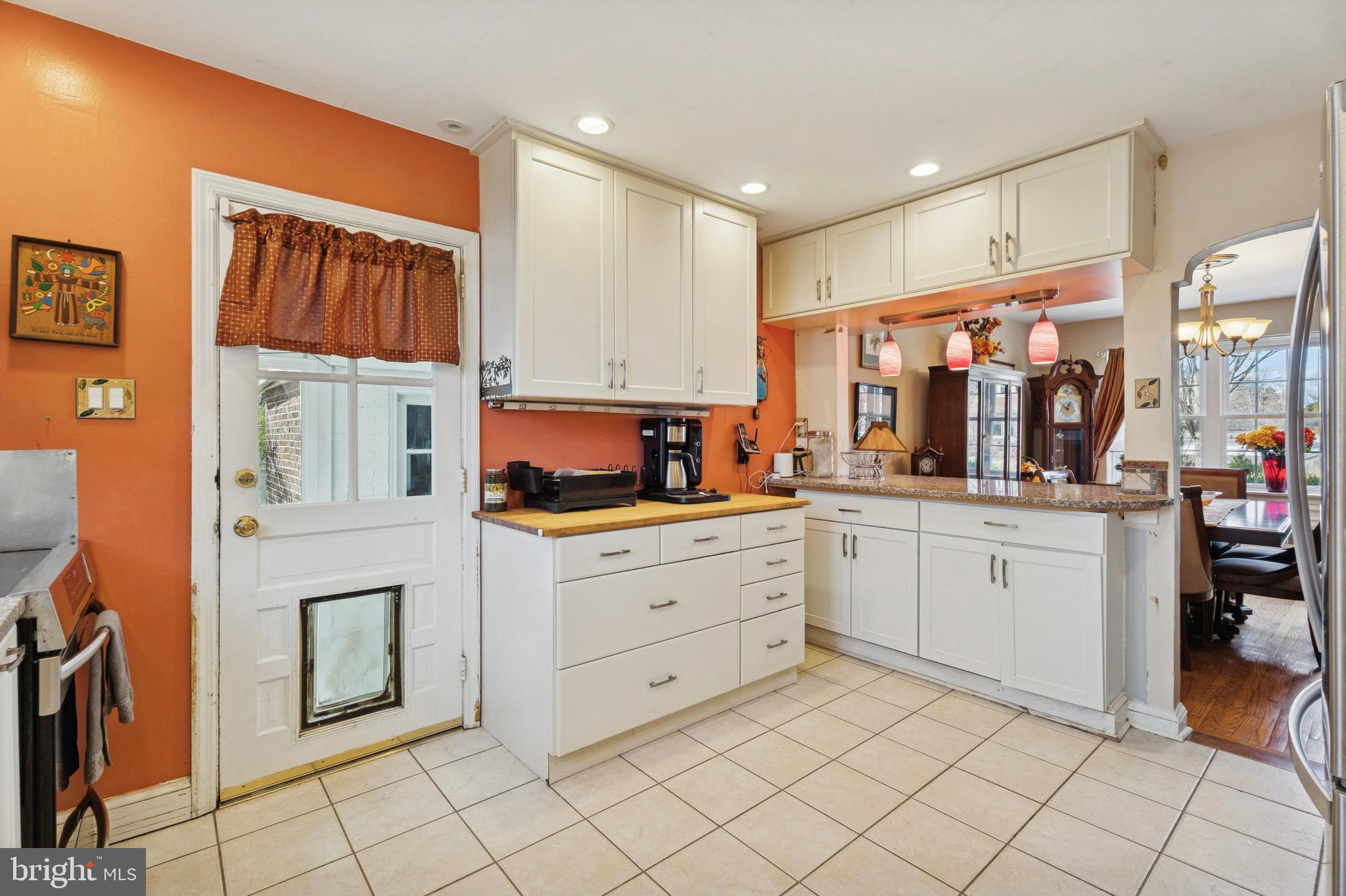 145 Merrybrook Drive Havertown, PA 19083 - Photo 11 of 29 a kitchen with cabinets and window