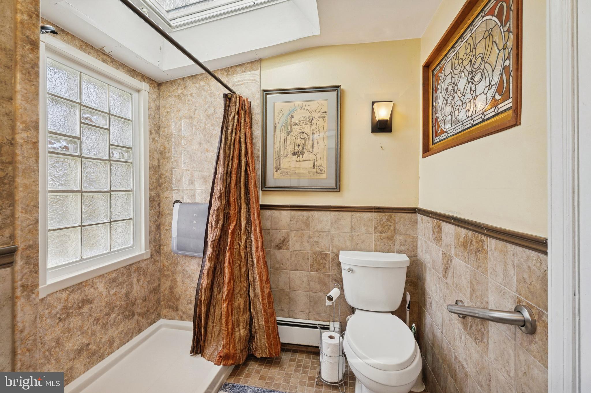 145 Merrybrook Drive Havertown, PA 19083 - Photo 17 of 29 a bathroom with a toilet and a shower