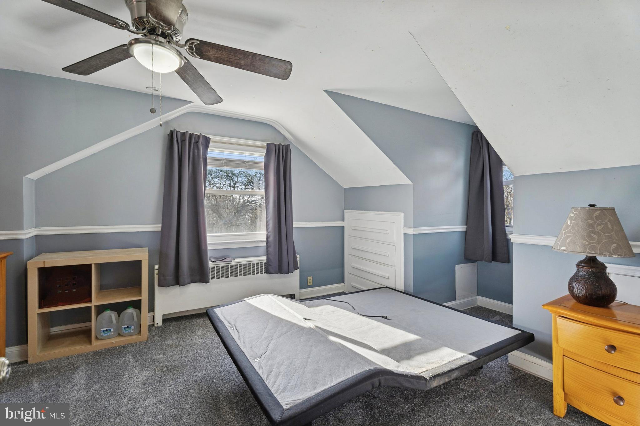 145 Merrybrook Drive Havertown, PA 19083 - Photo 19 of 29 a bedroom with a bed and a fireplace