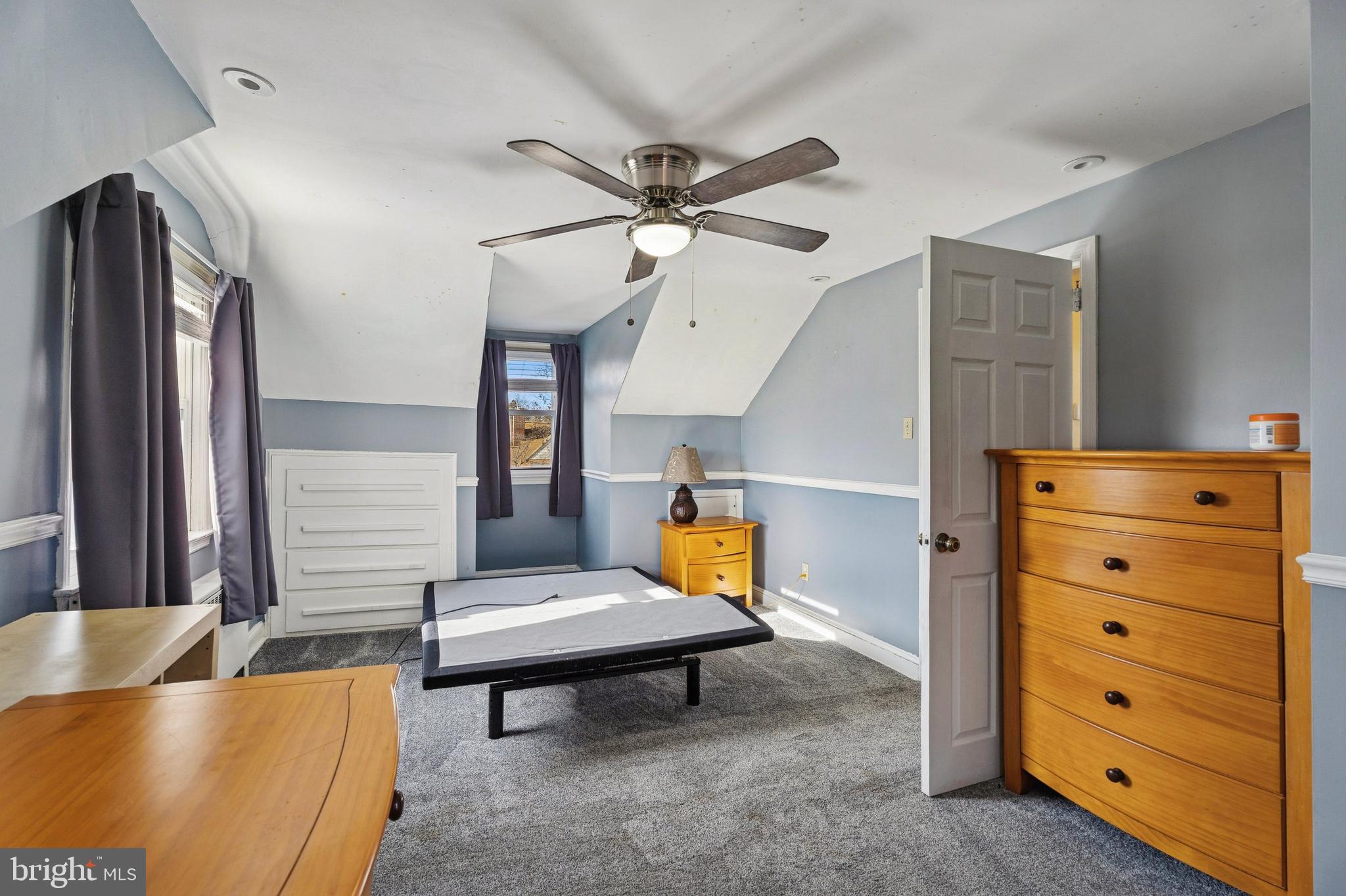 145 Merrybrook Drive Havertown, PA 19083 - Photo 20 of 29 a living room with furniture and a chandelier