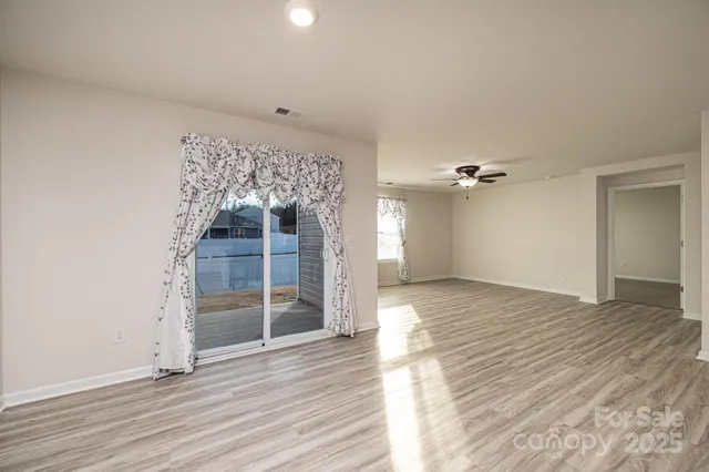 a kitchen with a table and chairs in it