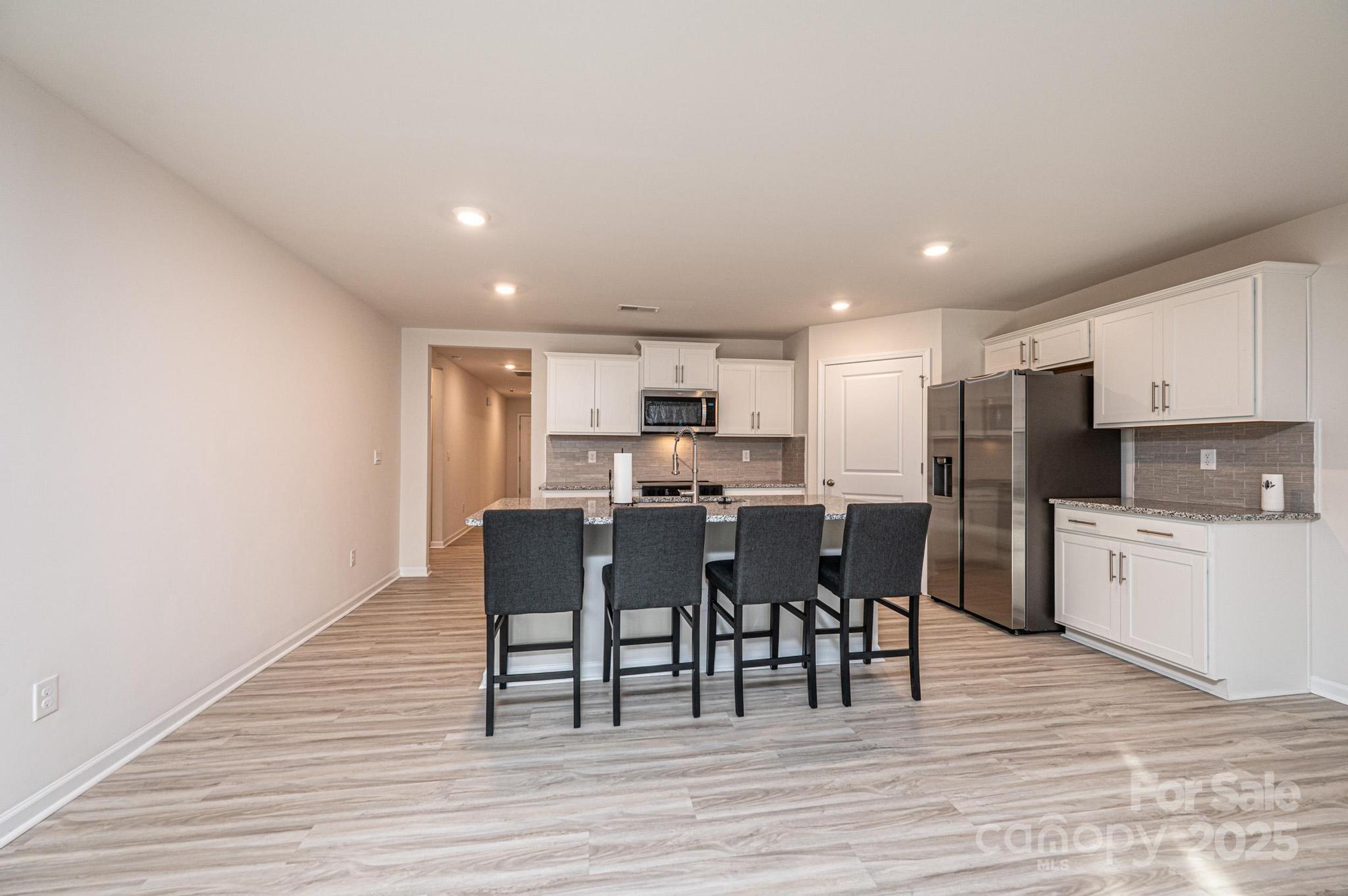 2542 Goose Fair Road Maiden, NC 28650 - Photo 21 of 48 a kitchen with a table and chairs in it
