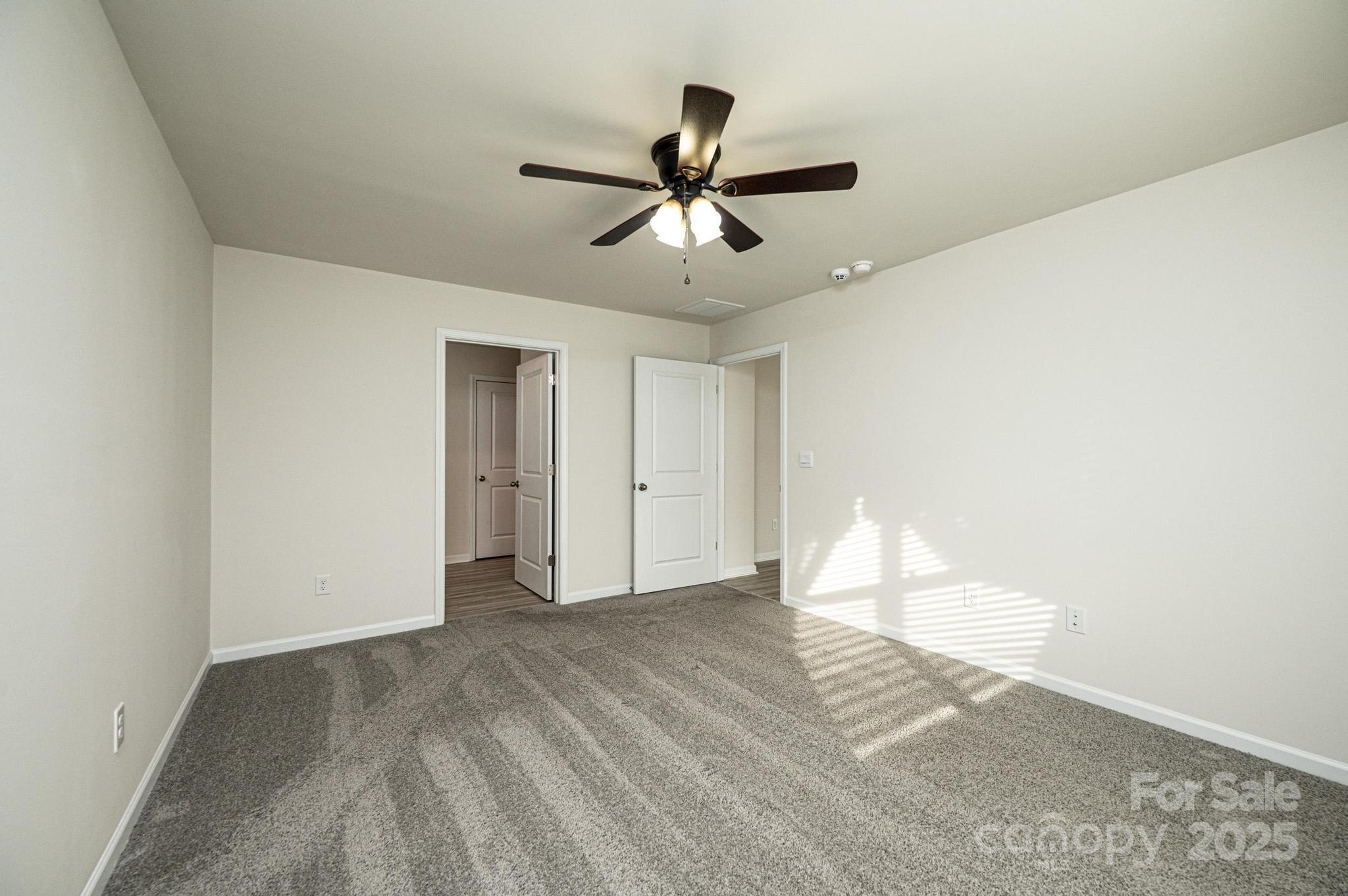 2542 Goose Fair Road Maiden, NC 28650 - Photo 26 of 48 a view of empty room with wooden floor and fan