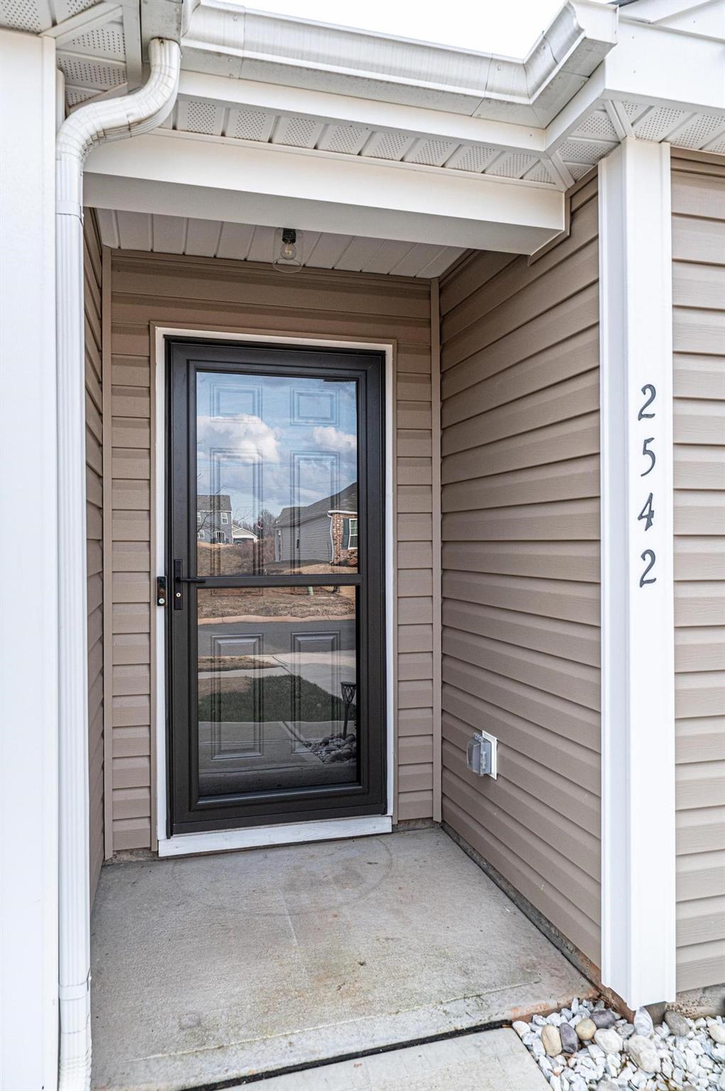 2542 Goose Fair Road Maiden, NC 28650 - Photo 6 of 48 a view of wooden door a living room and hallway