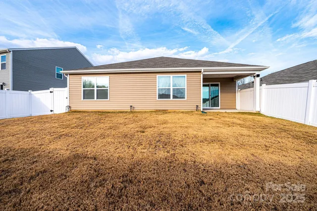 a kitchen with stainless steel appliances granite countertop a stove and a microwave