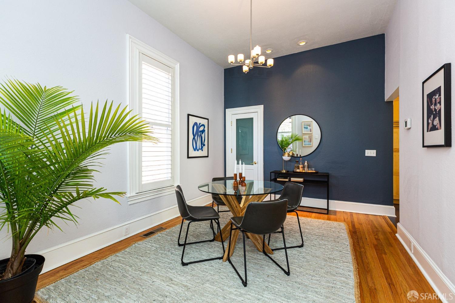1429 Chestnut Street Oakland, CA 94607 - Photo 2 of 20 a view of a dining room with furniture and chandelier