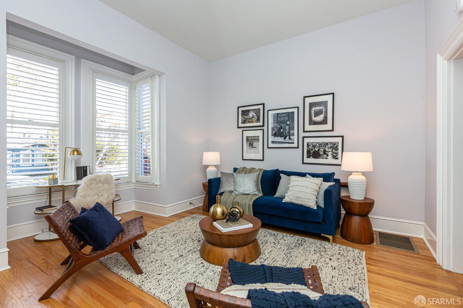 1429 Chestnut Street Oakland, CA 94607 - Photo 5 of 20 a living room with furniture and a large window