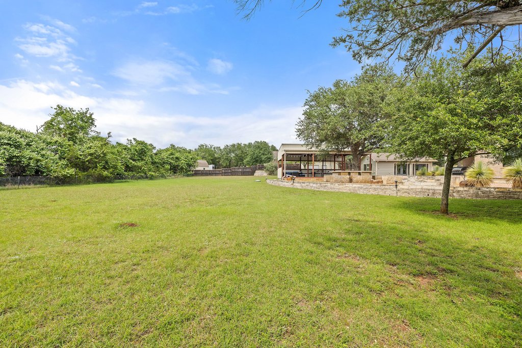 12135 Fitzhugh Road Austin, TX 78736 - Photo 28 of 30 a view of a lake with houses in the background