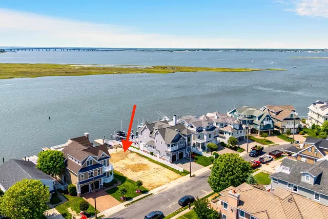 a view of a swimming pool with an outdoor seating
