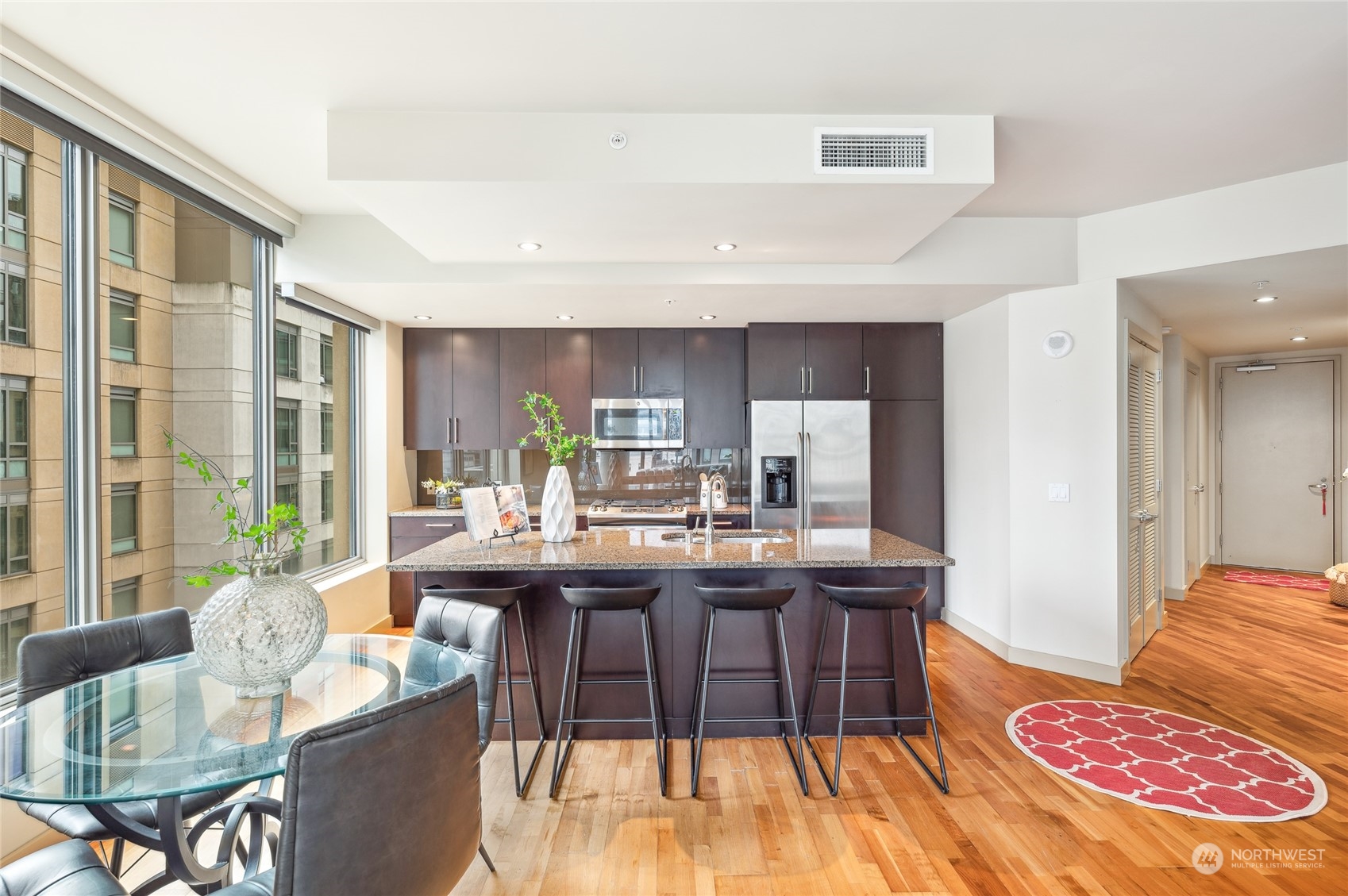 910 Lenora Street, Unit S907 Seattle, WA 98121 - Photo 16 of 38 a view of a dining room with furniture