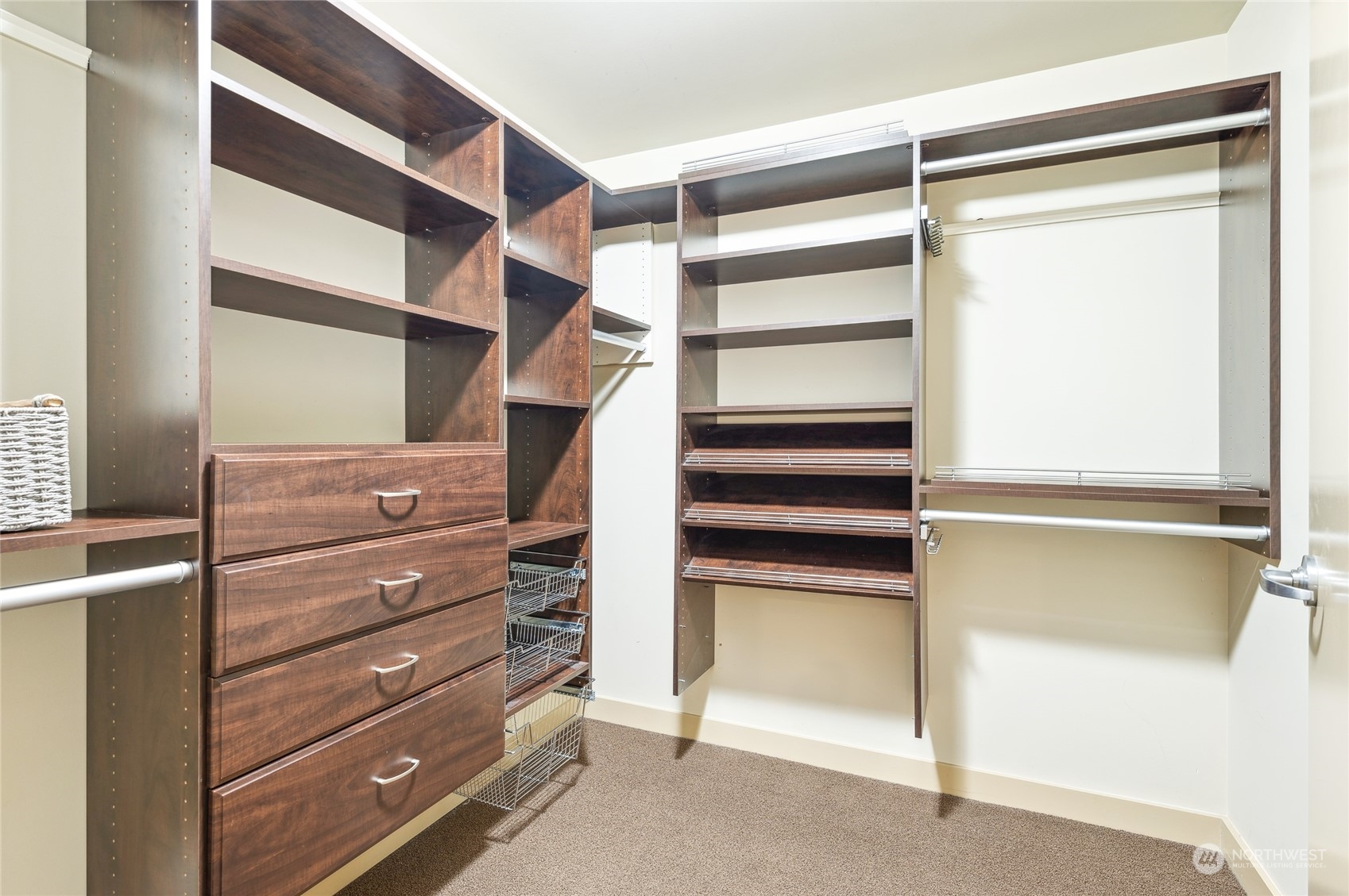 910 Lenora Street, Unit S907 Seattle, WA 98121 - Photo 27 of 38 a view of walk in closet with empty racks