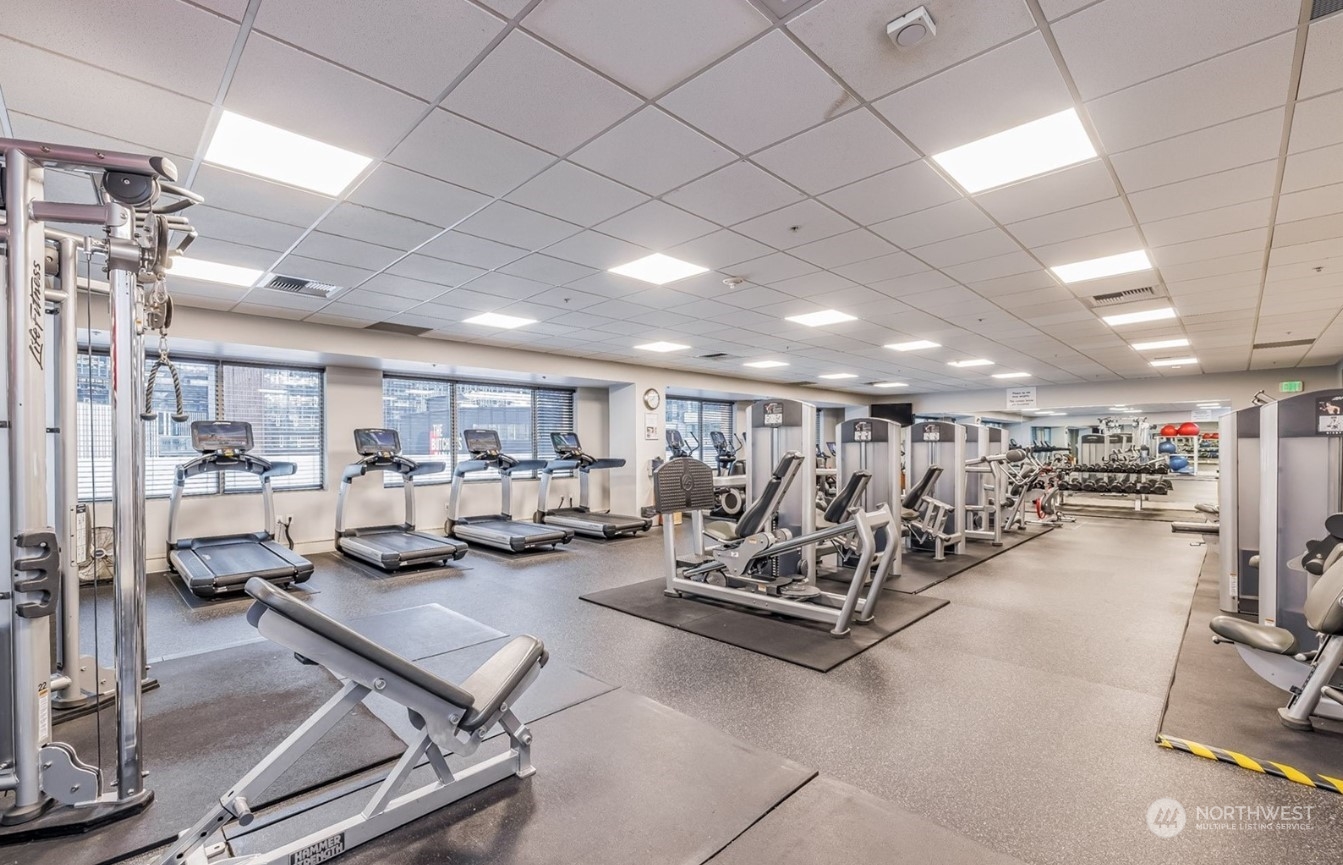 910 Lenora Street, Unit S907 Seattle, WA 98121 - Photo 36 of 38 a view of a room with gym equipment