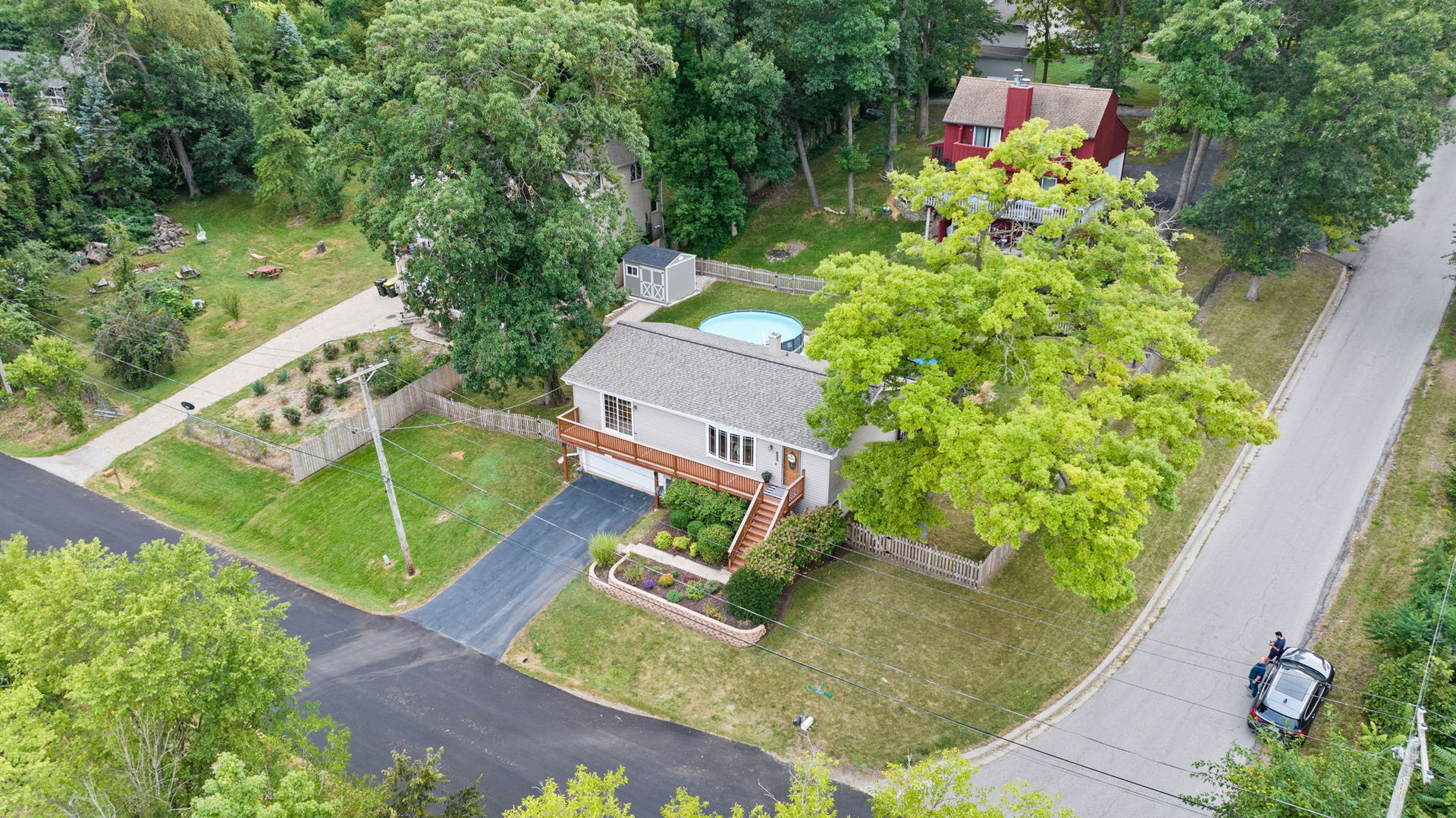 6N998 Riverside Drive St. Charles, IL 60174 - Photo 38 of 46 an aerial view of a house with a garden and trees