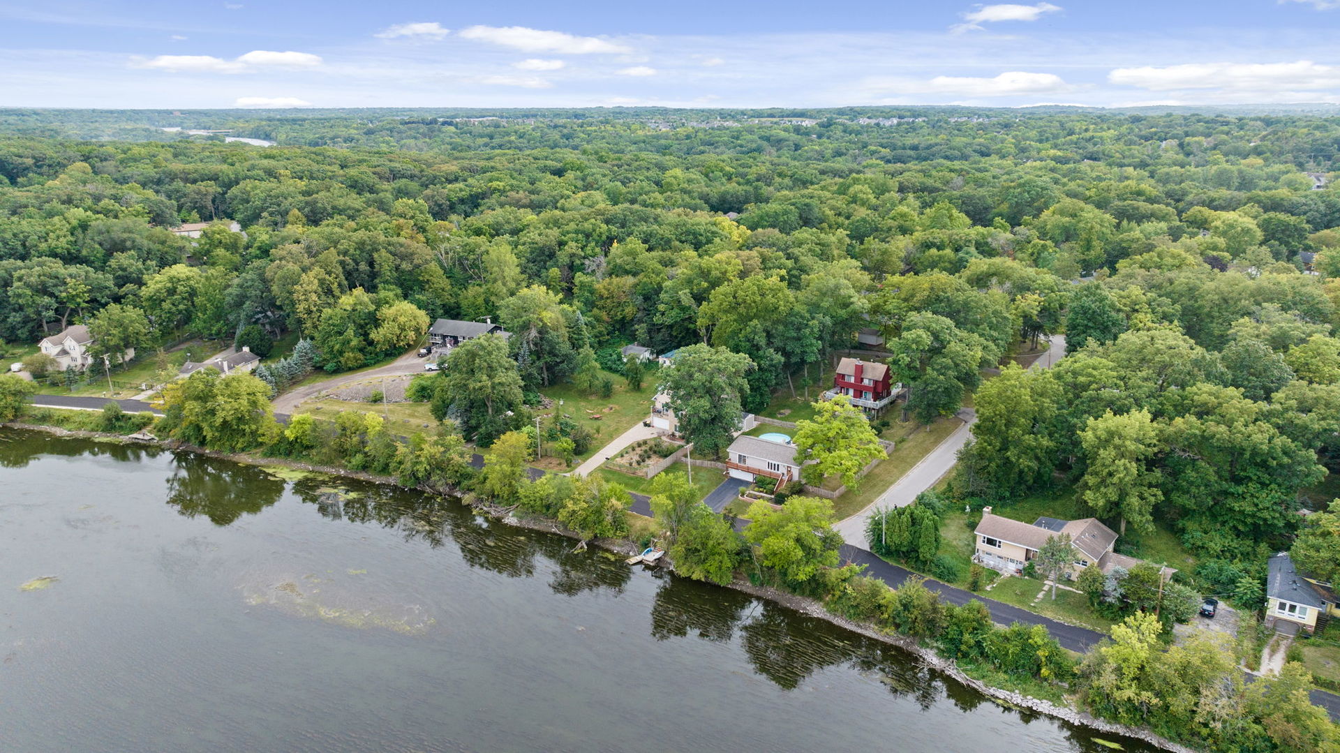 6N998 Riverside Drive St. Charles, IL 60174 - Photo 42 of 46 a view of a lake with a city