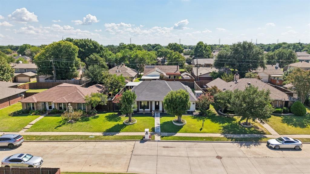 102 East Ridgegate Drive Garland, TX 75040 - Photo 26 of 31 a view of multiple houses with a yard