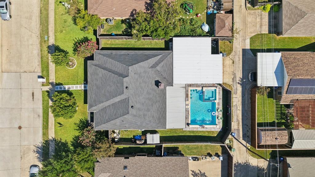 102 East Ridgegate Drive Garland, TX 75040 - Photo 29 of 31 aerial view of a house with a yard