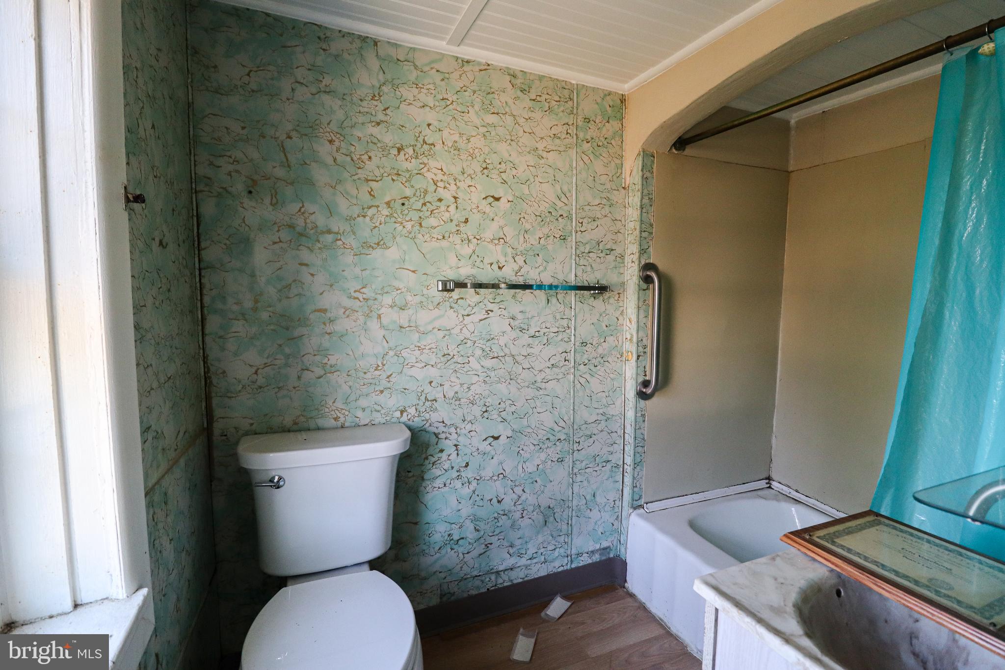 6481 Chambers Hill Road Harrisburg, PA 17111 - Photo 11 of 26 a bathroom with a toilet and a shower