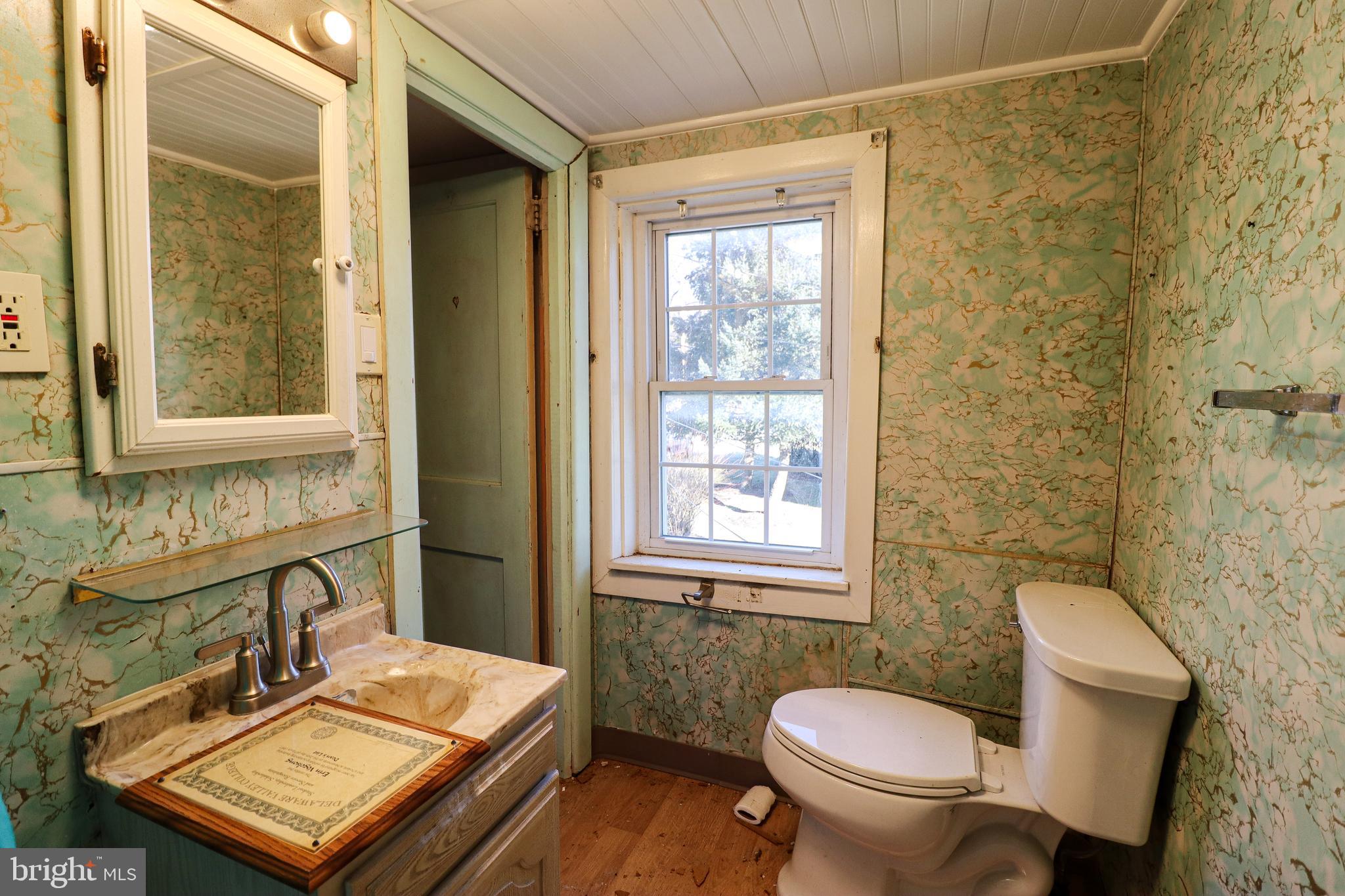 6481 Chambers Hill Road Harrisburg, PA 17111 - Photo 13 of 26 a bathroom with a sink toilet and shower