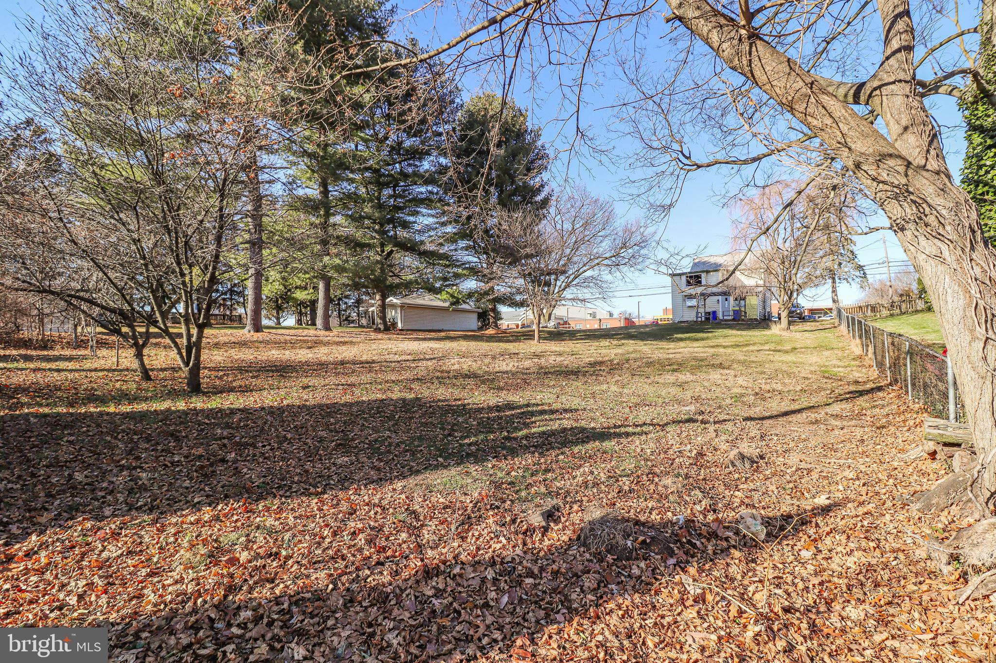 6481 Chambers Hill Road Harrisburg, PA 17111 - Photo 25 of 26 a view of a yard with plants and trees
