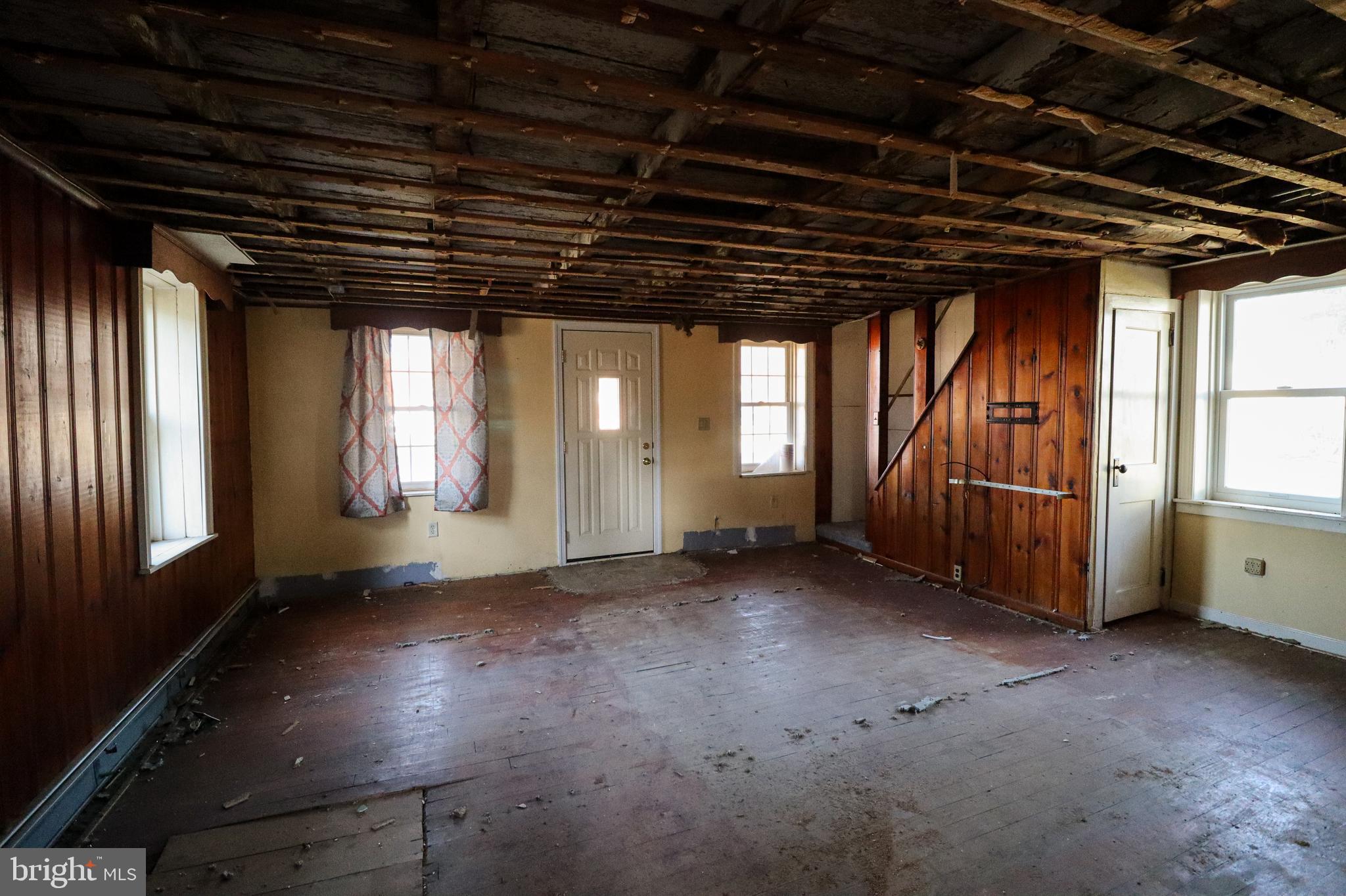 6481 Chambers Hill Road Harrisburg, PA 17111 - Photo 6 of 26 a view of an empty room with a window
