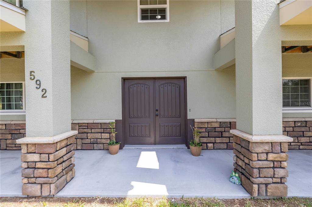 592 Ken Hubbard Road Terra Ceia, FL 34250 - Photo 4 of 34 a living room with furniture and a window