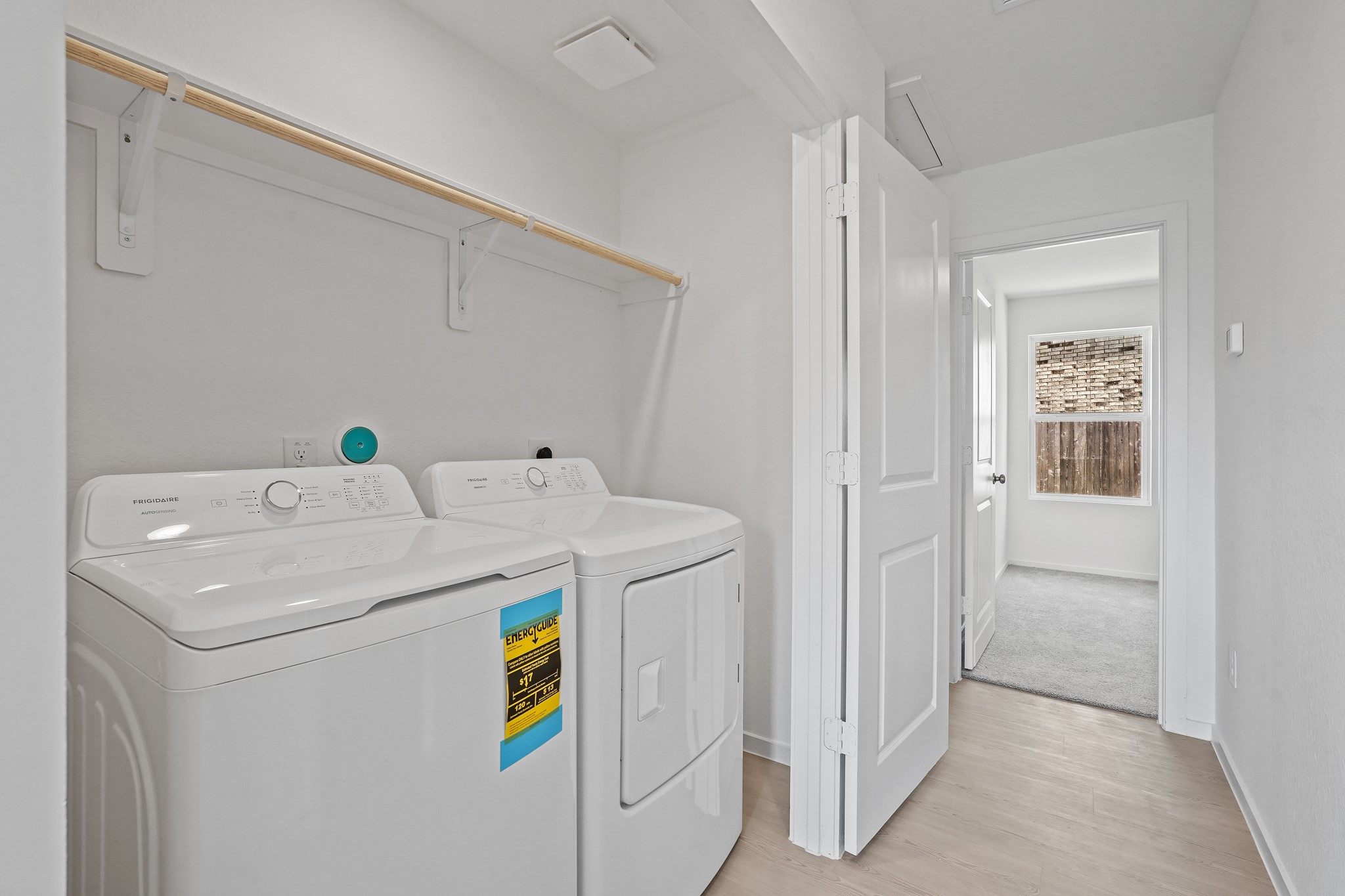 26931 Feather Reed Drive Katy, TX 77493 - Photo 12 of 16 Experience convenience with the in-house utility room, thoughtfully designed with a dedicated laundry area.