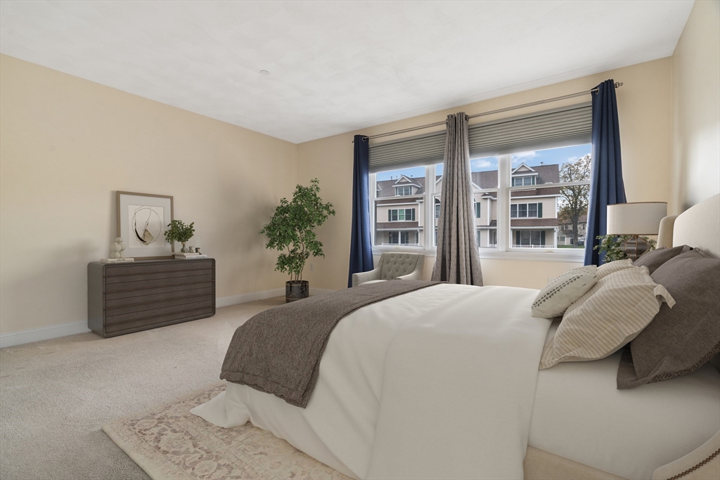 216 Rangeway Road, Unit 192 Billerica, MA 01862 - Photo 13 of 18 a bedroom with a large bed and a window