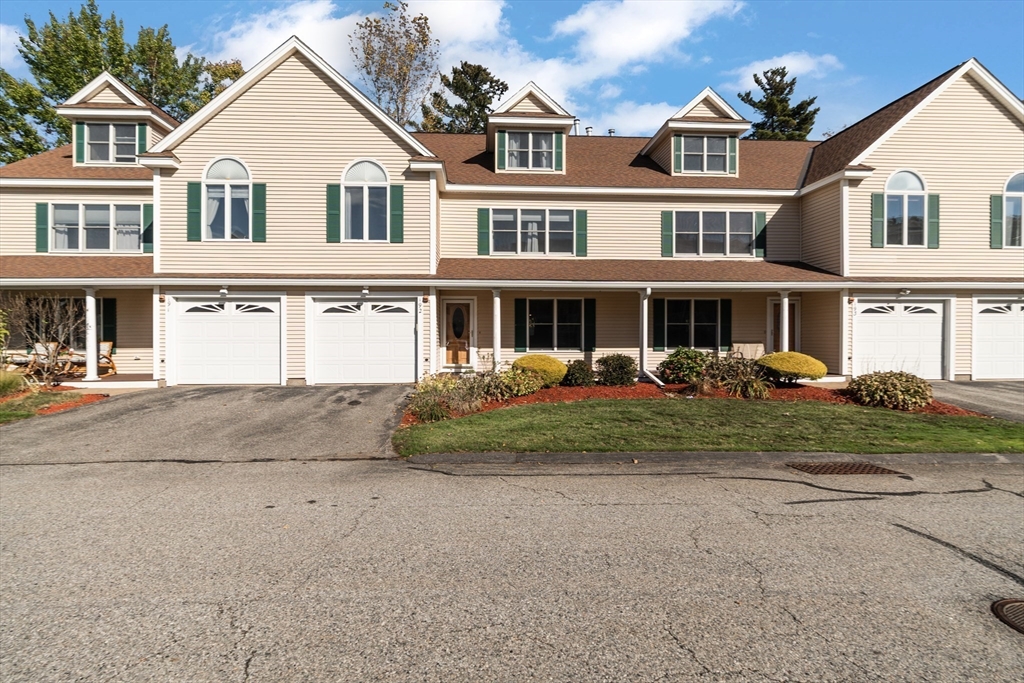 216 Rangeway Road, Unit 192 Billerica, MA 01862 - Photo 2 of 18 a front view of a house with a yard