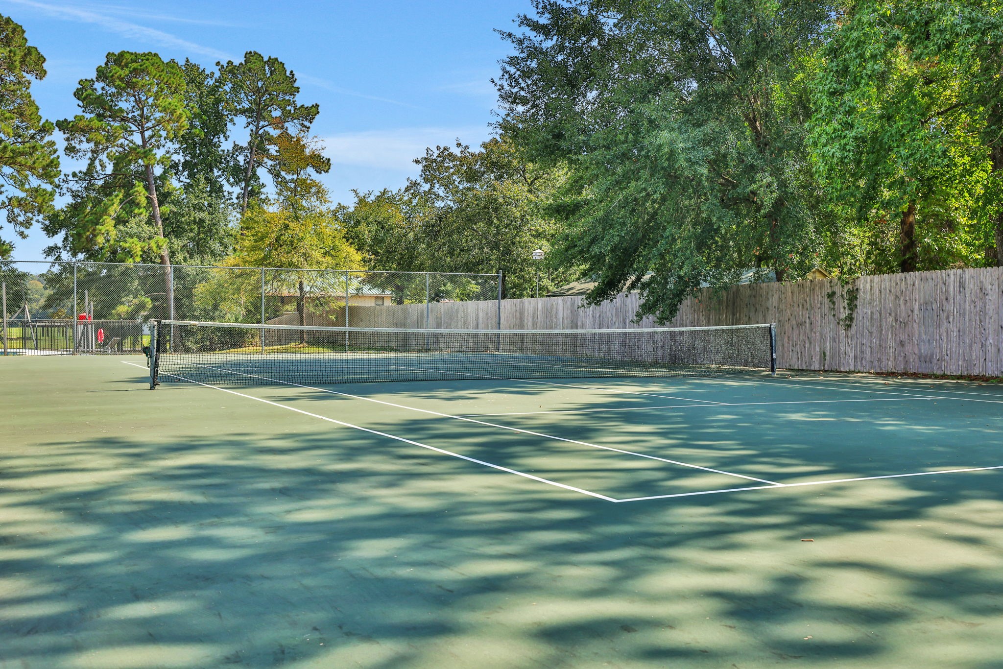 11 Peninsula Point Huntsville, TX 77340 - Photo 12 of 18 a view of a tennis court