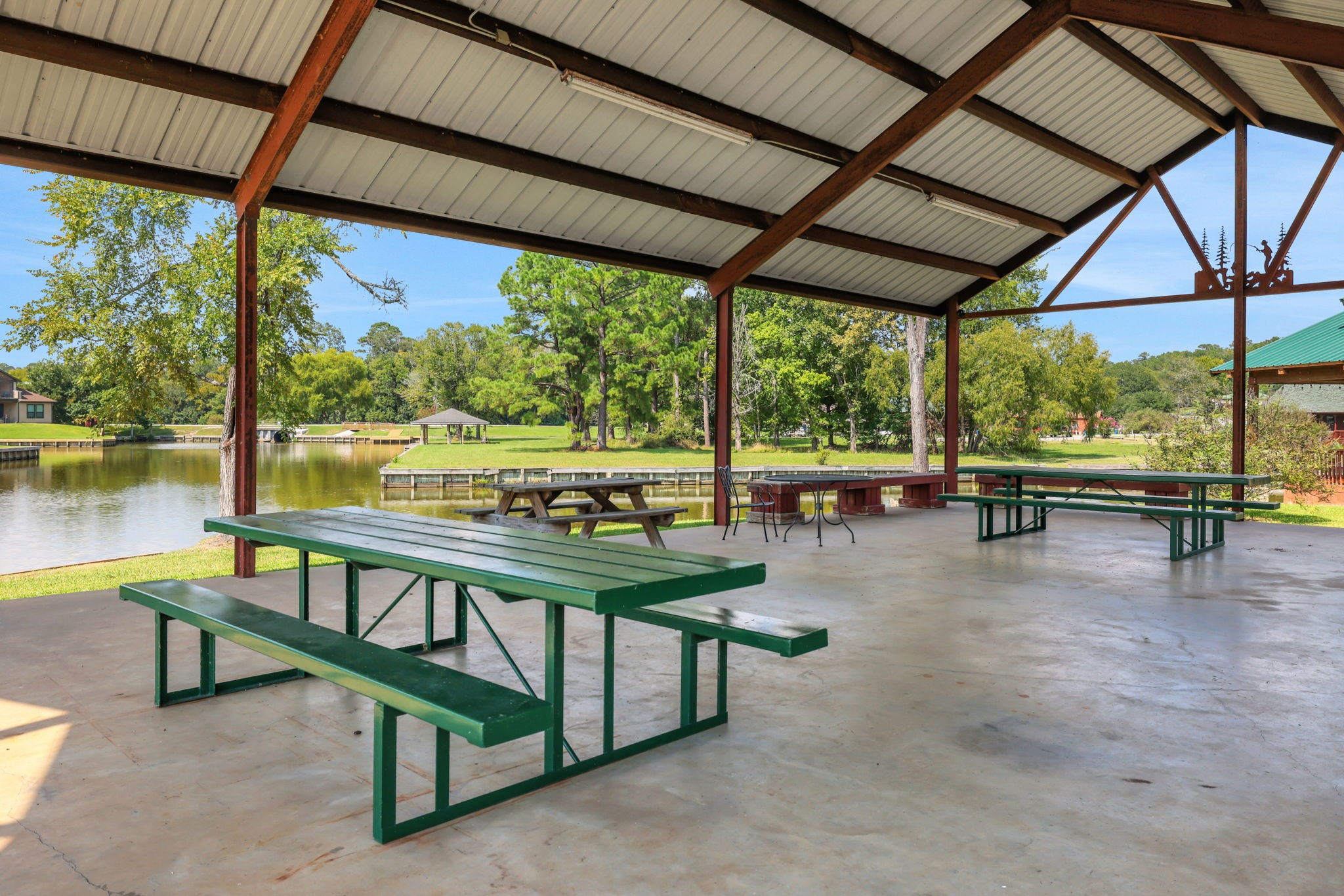 11 Peninsula Point Huntsville, TX 77340 - Photo 16 of 18 a view of a swimming pool with a patio