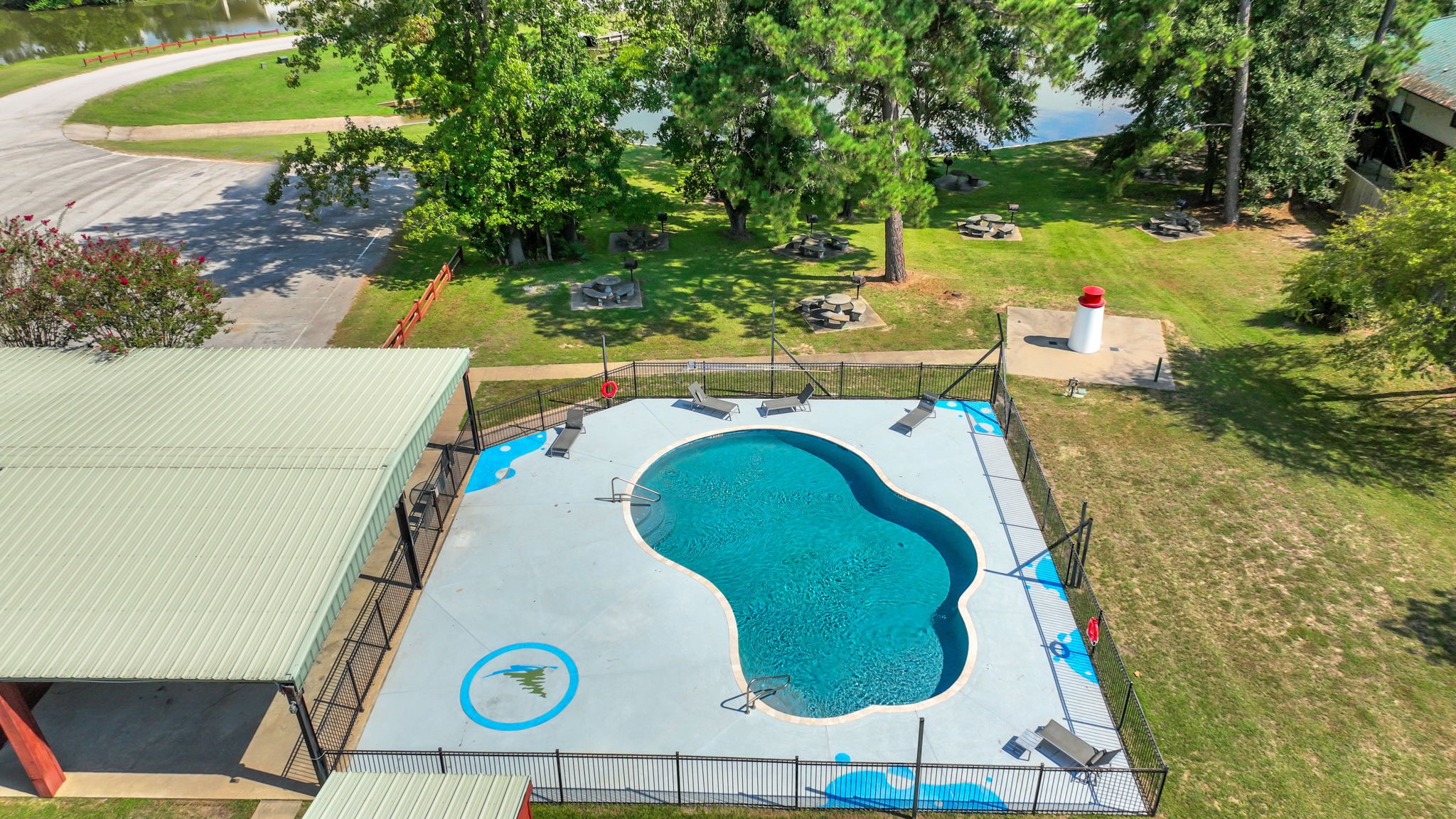11 Peninsula Point Huntsville, TX 77340 - Photo 9 of 18 an aerial view of a house with a swimming pool