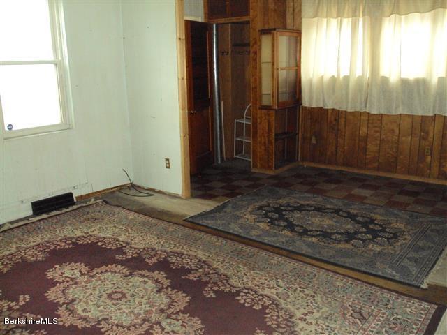 164 Columbia Street Adams, MA 01220 - Photo 4 of 9 a view of a livingroom with wooden floor and a window