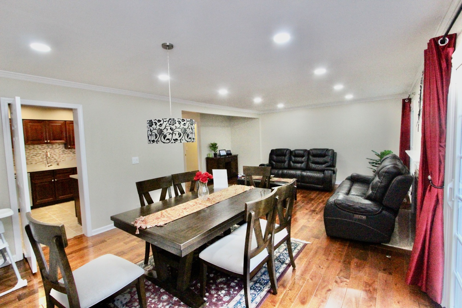 835 Suffield Square Lincolnshire, IL 60069 - Photo 15 of 44 a living room with furniture a rug and a painting