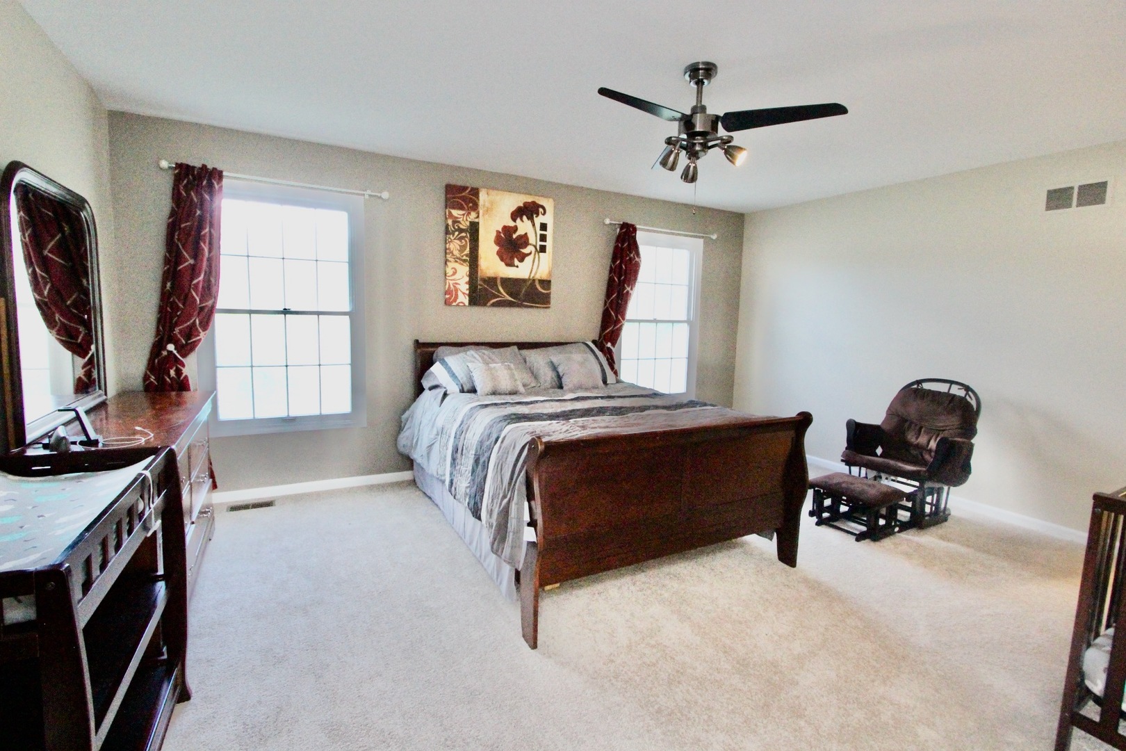 835 Suffield Square Lincolnshire, IL 60069 - Photo 21 of 44 a bedroom with a bed furniture and a window