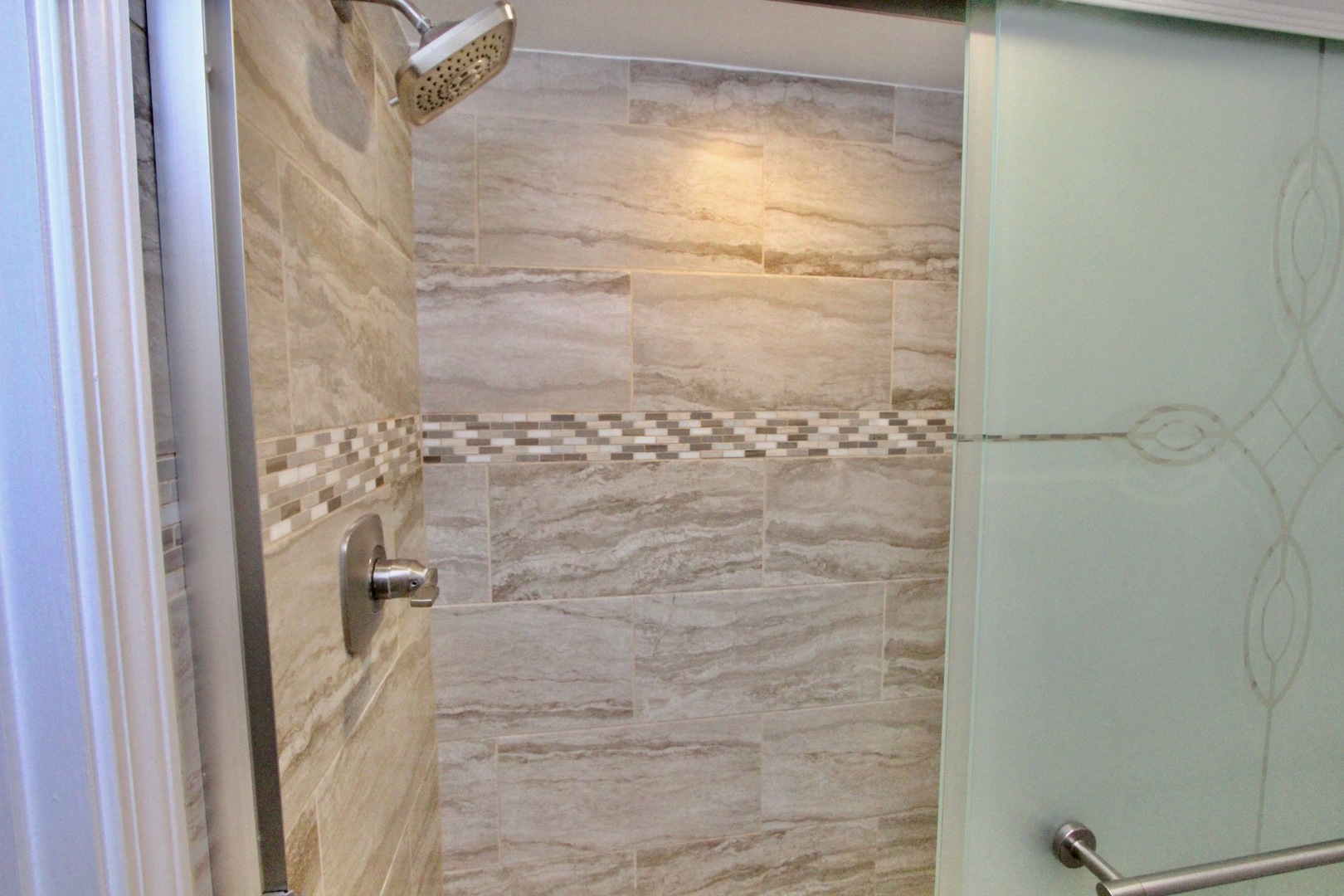 835 Suffield Square Lincolnshire, IL 60069 - Photo 26 of 44 a bathroom with a glass shower door