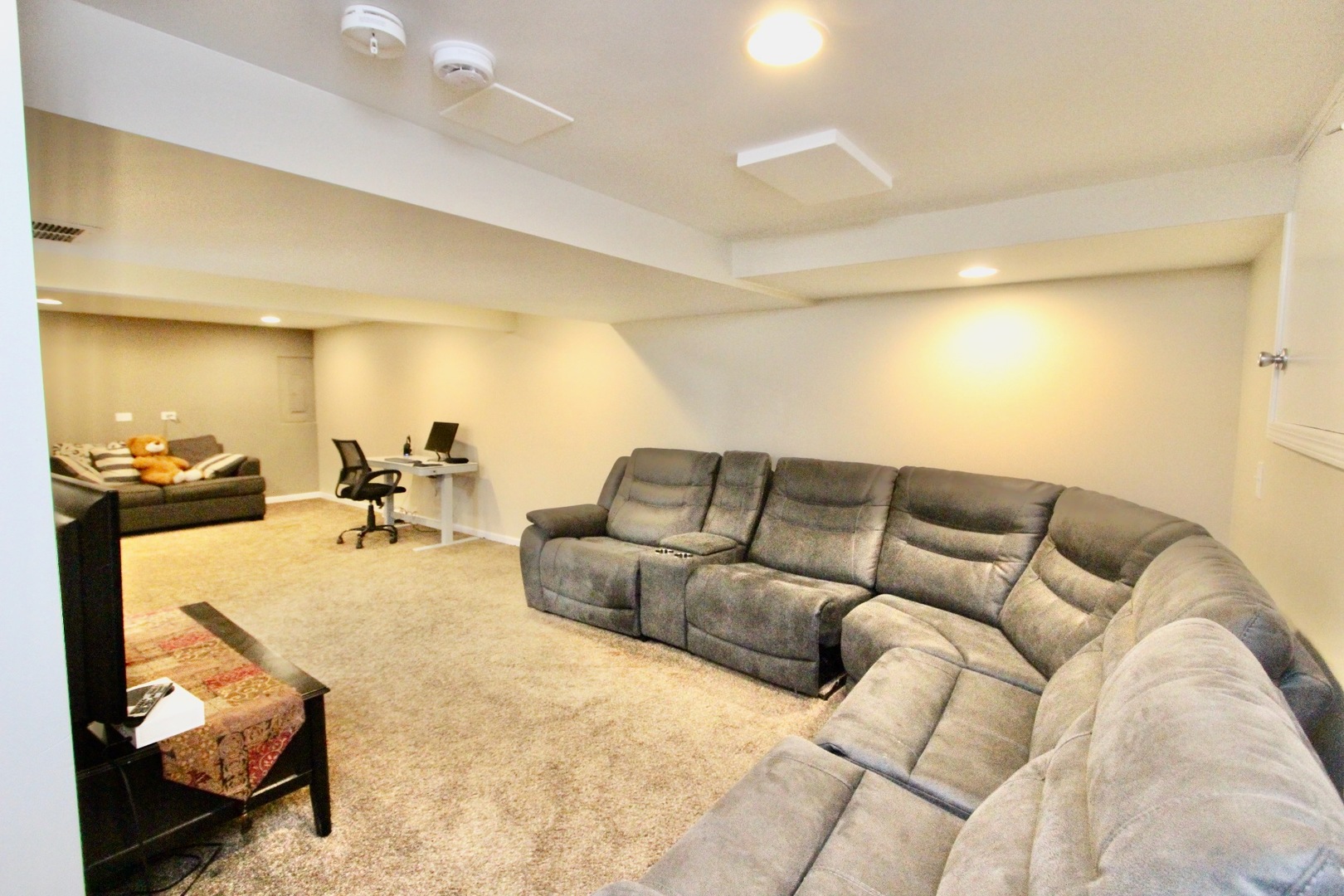 835 Suffield Square Lincolnshire, IL 60069 - Photo 33 of 44 a living room with furniture and a couch