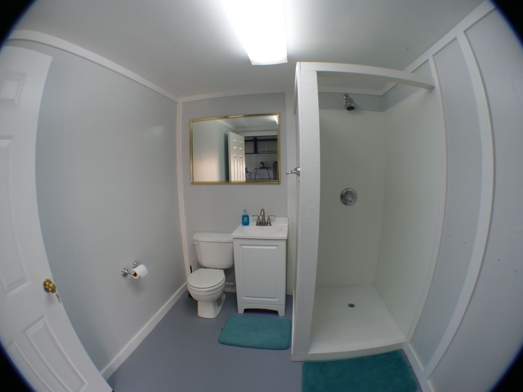 1615 East Wallisville Road Highlands, TX 77562 - Photo 21 of 32 a bathroom with a shower and a toilet