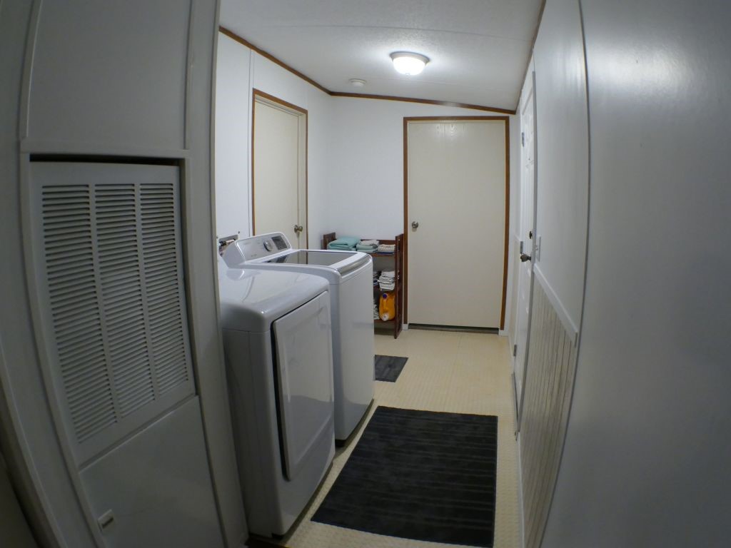 1615 East Wallisville Road Highlands, TX 77562 - Photo 26 of 32 a bathroom with sink and mirror