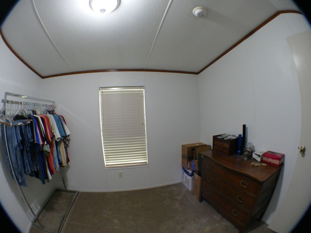 1615 East Wallisville Road Highlands, TX 77562 - Photo 29 of 32 a room with furniture and a window